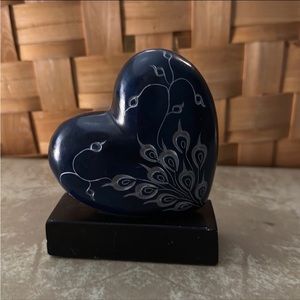 Carved stone heart statue